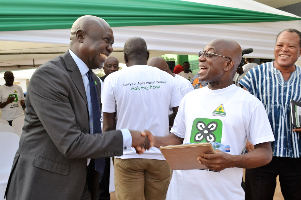 Kojo Mattah Apex Bank MD in an exciting mood with Teddy Osae, CEO NCR